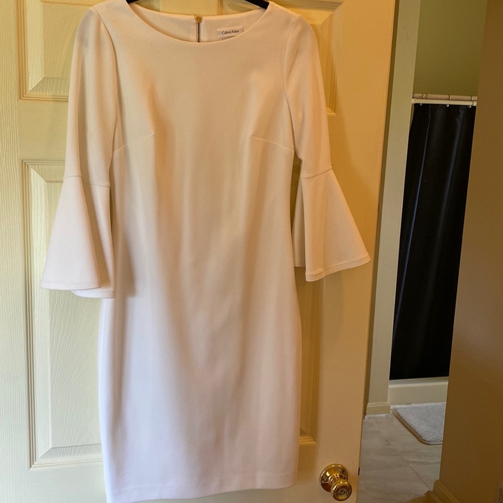 Calvin Klein size 8 dress in great shape. Off white color.